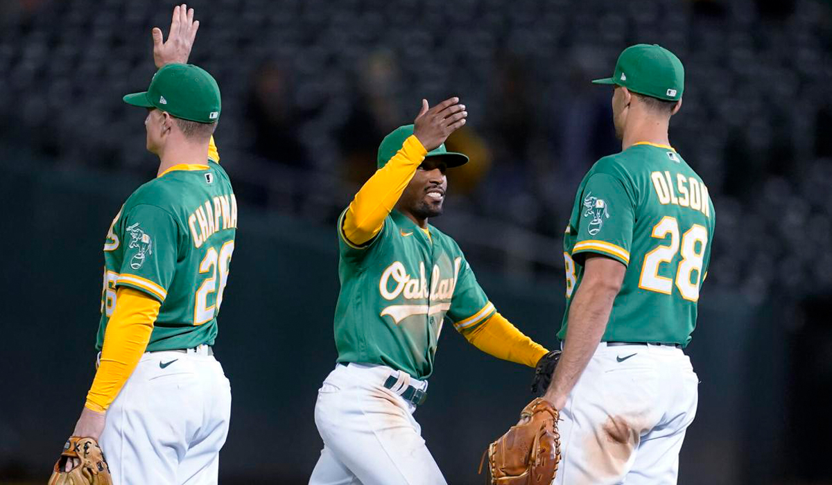 A's win again, gain ground in AL wild-card race